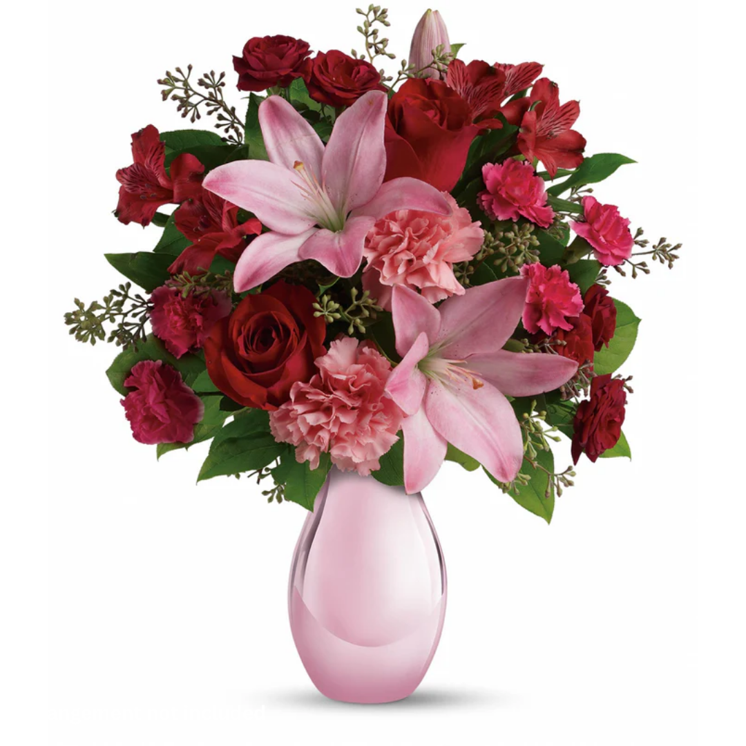 Roses and lilies bouquet in pink vase