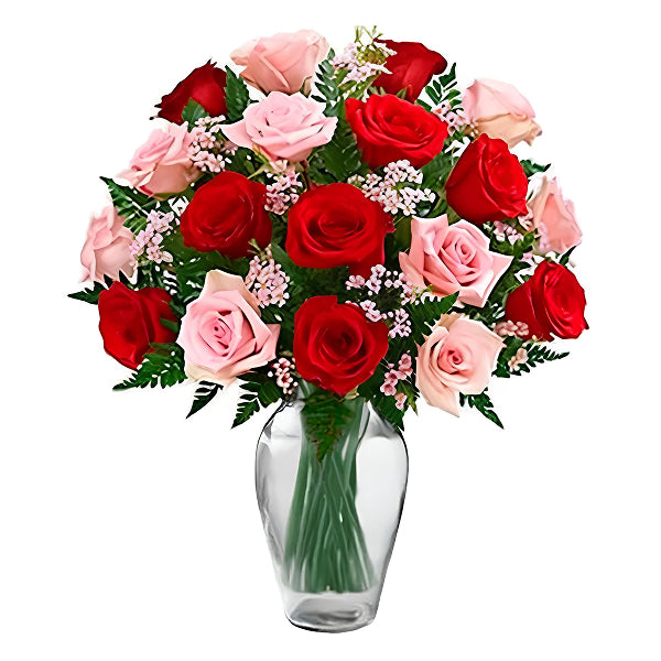 red and pink flowers in a vase